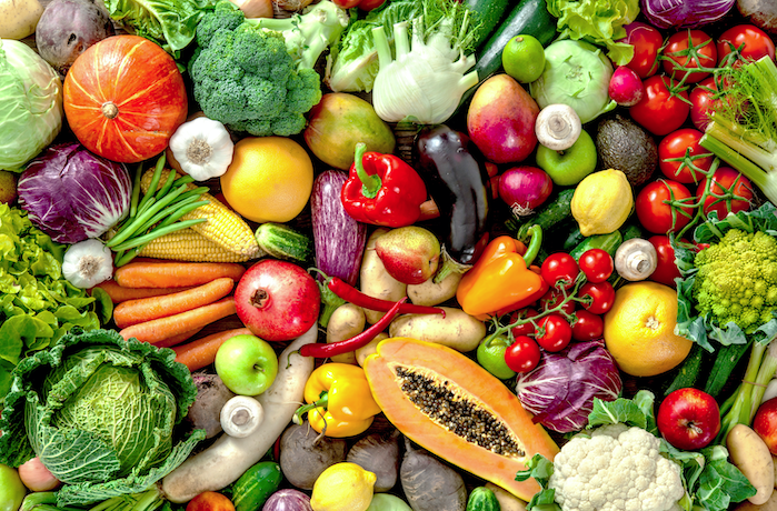 A pile of colorful fruits and vegetables.